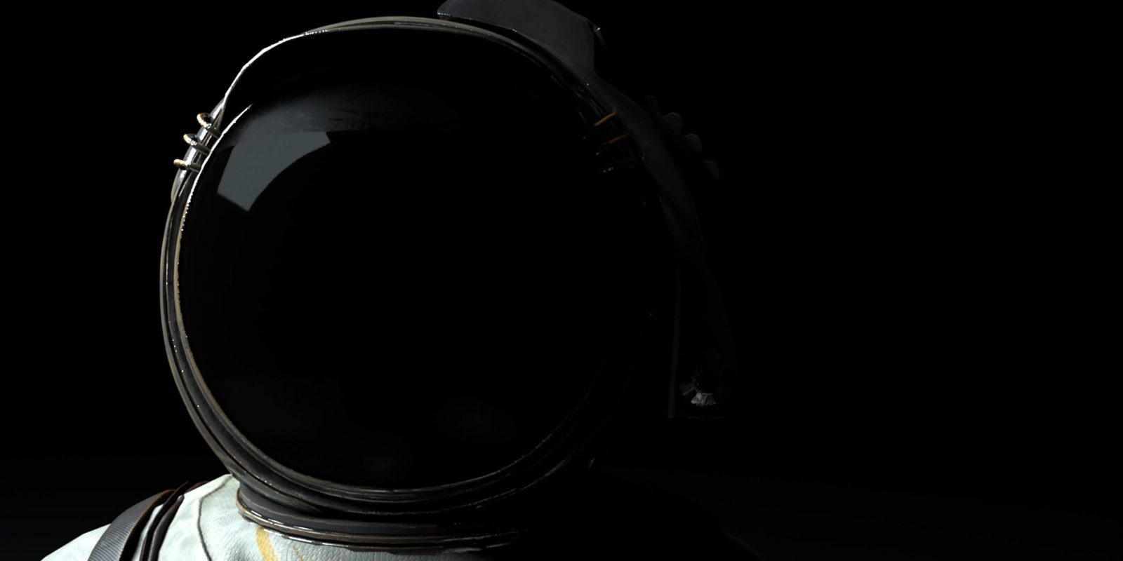 Gros plan sur un cosmonaute dont seul le casque et le haut des épaules sont visibles. Le fond est noir et rappelle l'absence de lumière dans l'espace. Mission Moon Rocks III prête à être lancée !